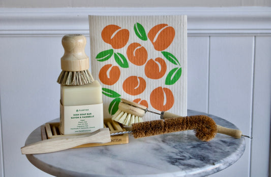 Zero Waste Kitchen Kit - The Big 6 Kitchen Kit featuring one bottle brush, one dish brush, 1 pot scrubber, 1 soap block, one soap dish, and one reusable paper towel replacement cloth
